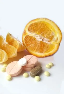 Orange fruit or tablets 스톡 사진
