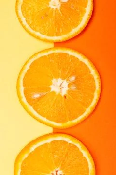 Orange fruit pattern composition. Summer healthy food background. Stock Photos