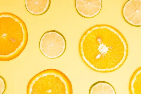 Orange fruit pattern composition. Summer healthy food background. Stock Photos