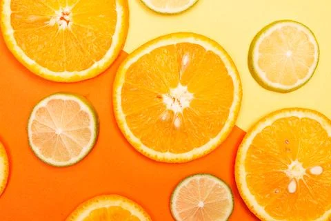 Orange fruit pattern composition. Summer healthy food background. Stock Photos