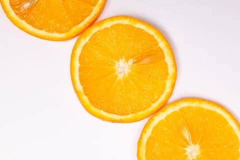 Orange fruit pattern composition. Summer healthy food background. Stock Photos