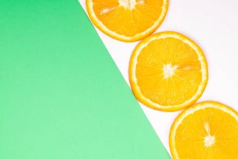 Orange fruit pattern composition. Summer healthy food background. Stock Photos