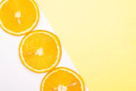 Orange fruit pattern composition. Summer healthy food background. Stock Photos