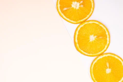 Orange fruit pattern composition. Summer healthy food background. Stock Photos