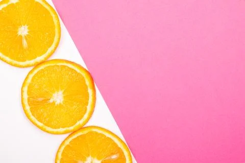Orange fruit pattern composition. Summer healthy food background. Stock Photos