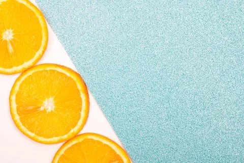 Orange fruit pattern composition. Summer healthy food background. Stock Photos