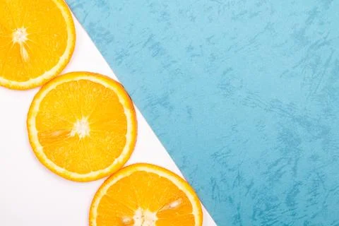 Orange fruit pattern composition. Summer healthy food background. Stock Photos