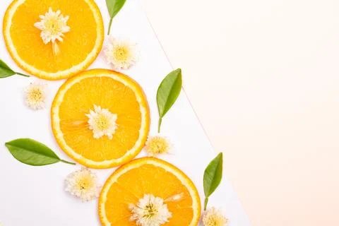Orange fruit pattern composition. Summer healthy food background. Stock Photos