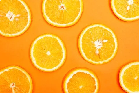 Orange fruit pattern composition. Summer healthy food background. Stock Photos
