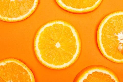 Orange fruit pattern composition. Summer healthy food background. Stock Photos