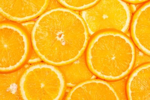 Orange fruit pattern composition. Summer healthy food background. Stock Photos