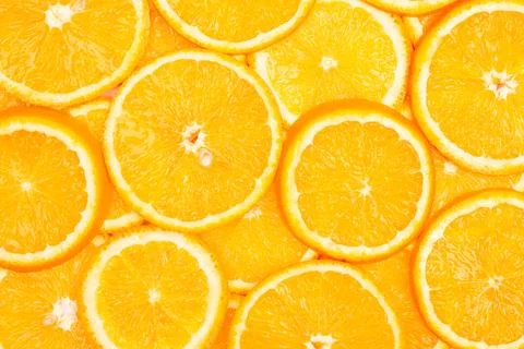 Orange fruit pattern composition. Summer healthy food background. Stock Photos