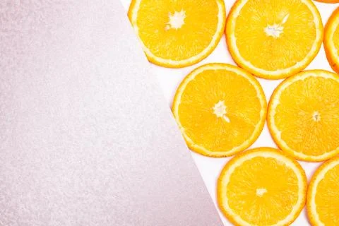 Orange fruit pattern composition. Summer healthy food background. Stock Photos