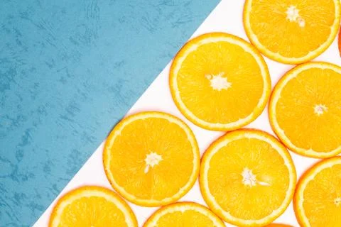 Orange fruit pattern composition. Summer healthy food background. Stock Photos