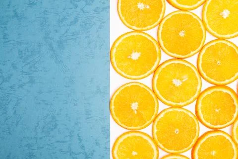 Orange fruit pattern composition. Summer healthy food background. Stock Photos