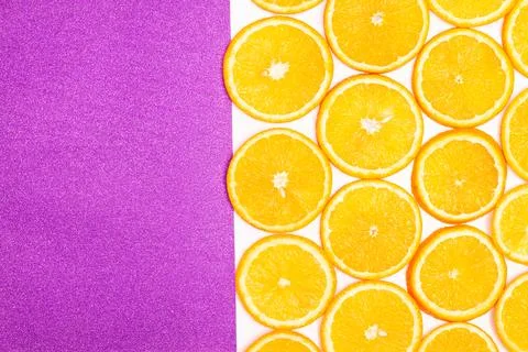 Orange fruit pattern composition. Summer healthy food background. Stock Photos