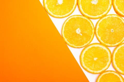 Orange fruit pattern composition. Summer healthy food background. Stock Photos