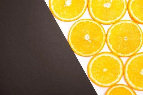 Orange fruit pattern composition. Summer healthy food background. Stock Photos