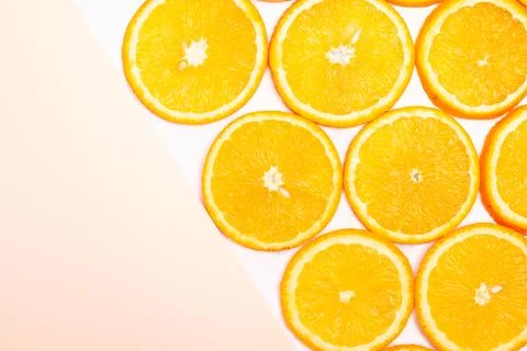 Orange fruit pattern composition. Summer healthy food background. Stock Photos