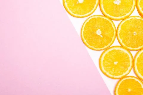 Orange fruit pattern composition. Summer healthy food background. Stock Photos