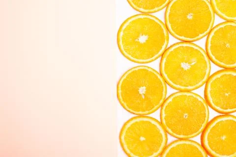 Orange fruit pattern composition. Summer healthy food background. Stock Photos
