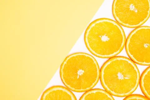 Orange fruit pattern composition. Summer healthy food background. Stock Photos