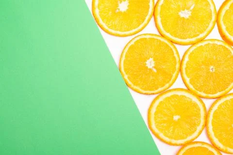 Orange fruit pattern composition. Summer healthy food background. Stock Photos