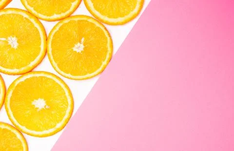 Orange fruit pattern composition. Summer healthy food background. Stock Photos