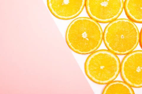 Orange fruit pattern composition. Summer healthy food background. Stock Photos