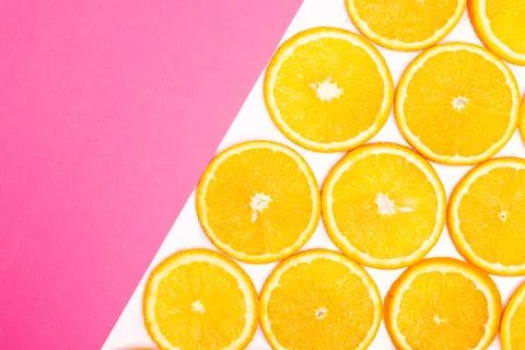 Orange fruit pattern composition. Summer healthy food background. Stock Photos