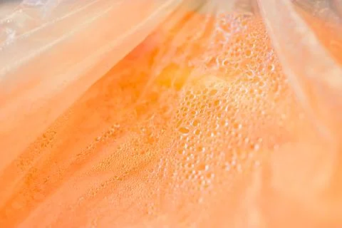 Orange fruit in plastic package Stock Photos