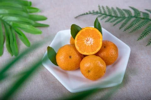 Orange fruit on a plate Stock Photos