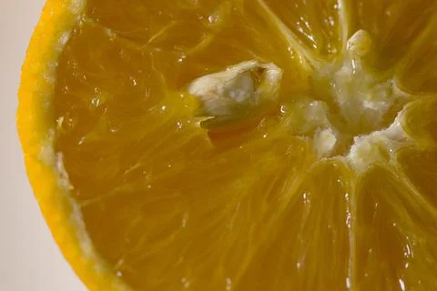 Orange fruit an seed on the table Stock Photos