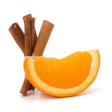Orange fruit segment and  cinnamon sticks isolated on white background. Stock Photos