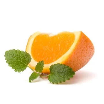 Orange fruit segment and citron mint leaf Stock Photos