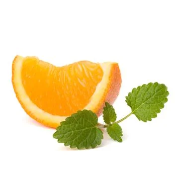 Orange fruit segment and citron mint leaf Stock Photos