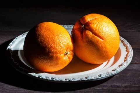 Orange fruit with shadow Foto stock