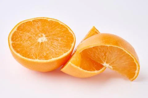 Orange fruit sliced open presenting vibrant healthy texture Stock Photos