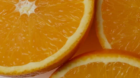 Orange fruit slices closeup, Orange fruits top view. Rotation Stock Footage 145511250