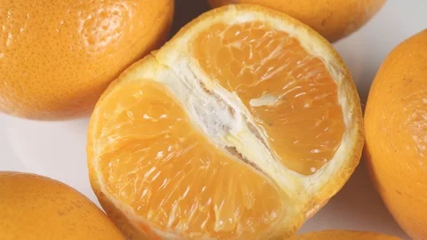 Orange fruit on a uniform background. Stock Footage 108015360