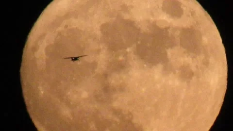 Orange Full Moon with Plane Video stock 159371342
