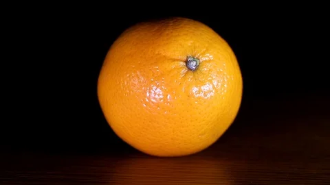 Orange full shot with light moving by. Stock Footage 123394218