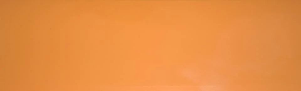 Orange glossy background horizontally positioned. Stock Photos