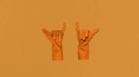 Orange gloves in plain background. Stock Illustration