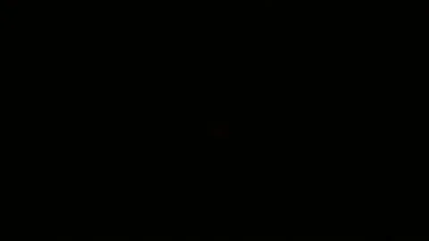 Orange glowing ball on a black background. Stock Footage 104568872