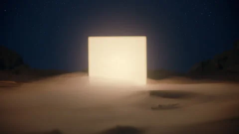An orange glowing monolith in a desert on another planet at night Stock Footage 274638413