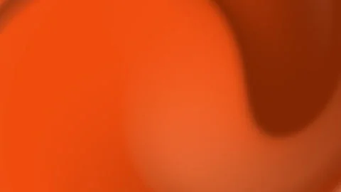 Orange gradient background features subtle shading variations. Video stock 295379165
