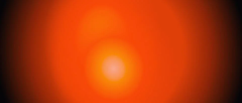 Orange gradient background with soft glowing light orb. Warm amber illumina.. Stock Illustration