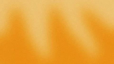 Orange grainy background with three diagonal light beams creating a textured  Stock Photos