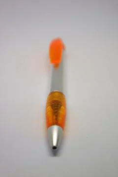 Orange gray color of pen with white background Stockfoto's